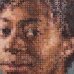Chuck Close mosaic of a woman's face in the 86th street subway of New York