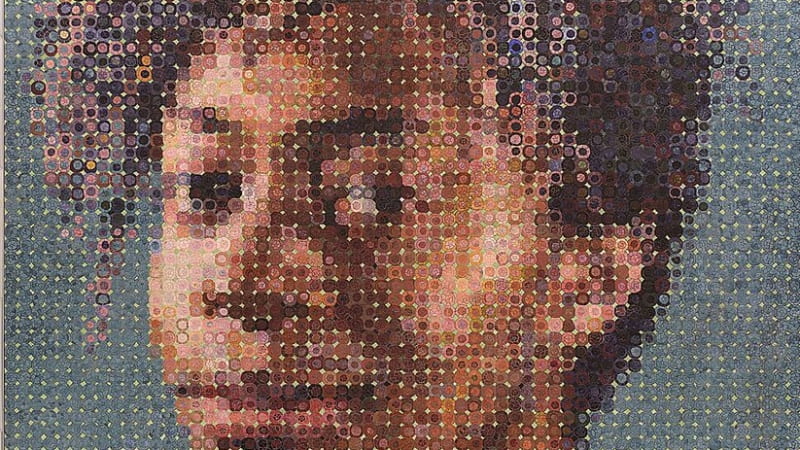 Chuck Close mosaic of a woman's face in the 86th street subway of New York