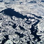 Methane leaking through cracks in the Arctic tundra. Photo by NASA's Earth Observatory; used under Creative Commons.